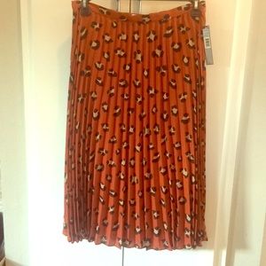 Tahari leopard print, mid-length skirt